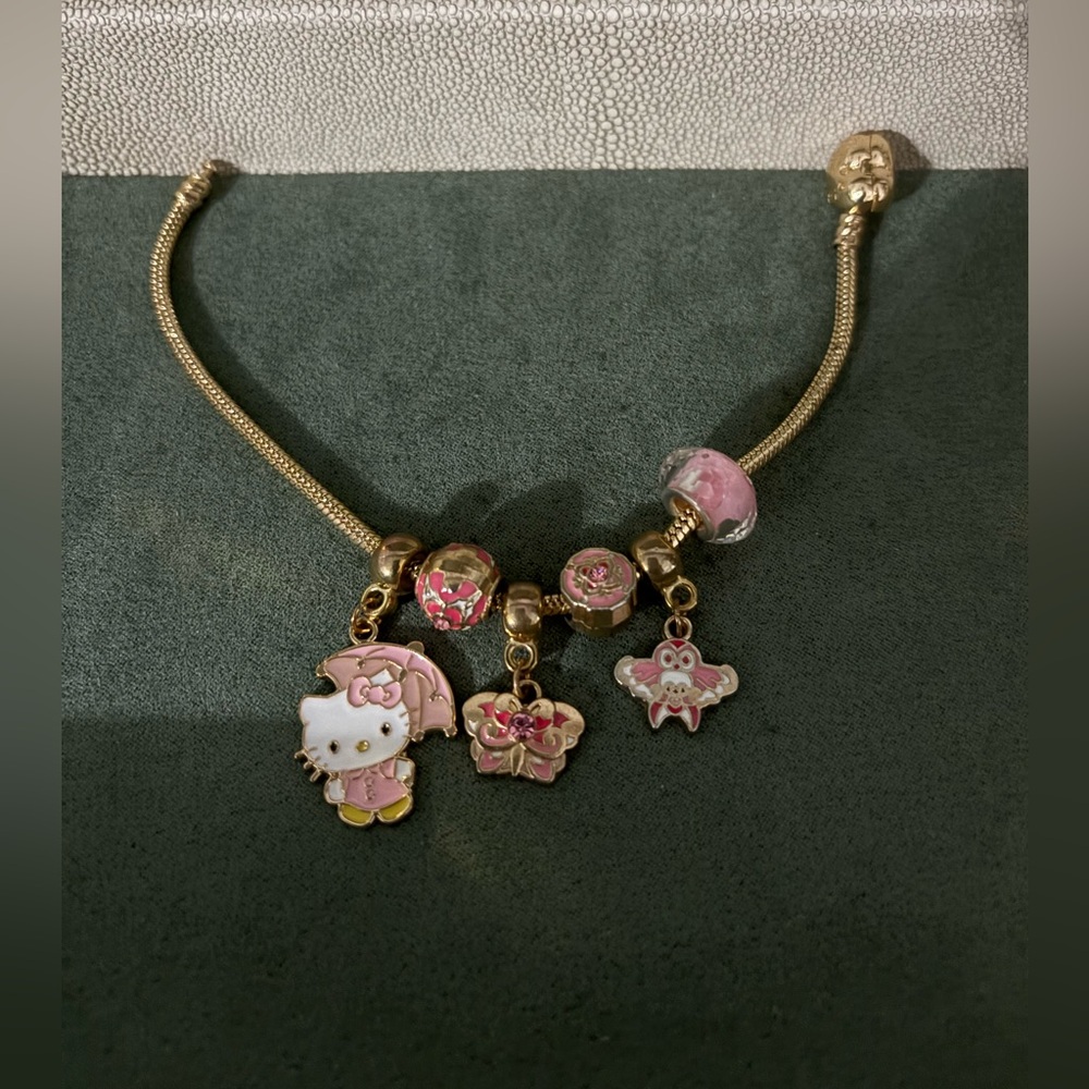 Gold and Pink Charm Bracelet - Picture 14 of 16